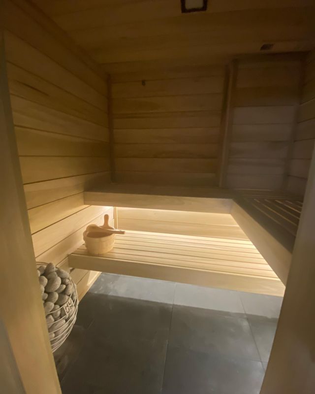 Once the primary bedroom now a gym with a dry sauna in the previous primary closet.  Swipe for more pics of making the most of this health space.